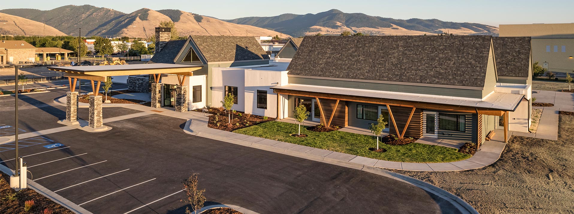 Partners Hope Foundation - Front Building with Mount Sentinel in background - Project Highlight CMA